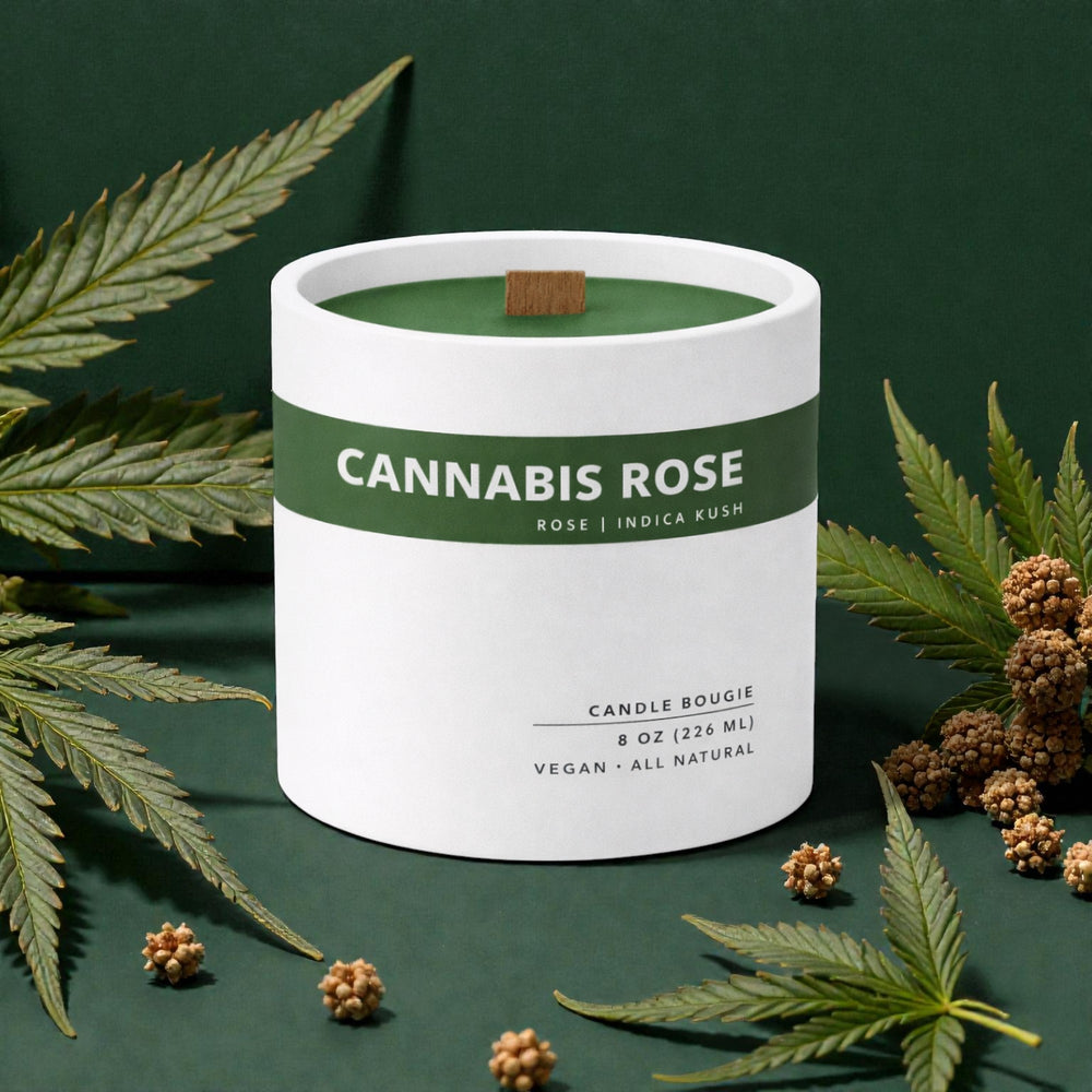 Candle labeled 'Cannabis Rose' with cannabis leaves and buds on a green background