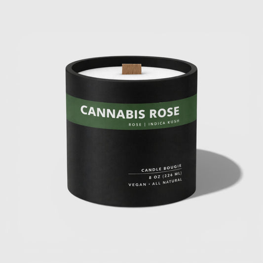 Candle with 'Cannabis Rose' label on a white background