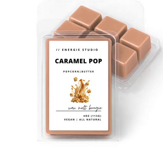 Caramel pop wax melts in a clear container with a label on a white background