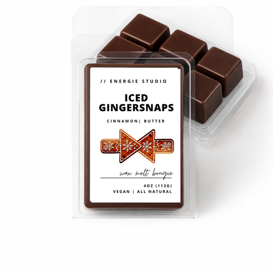 Packaged wax melts labeled 'ICED GINGERSNAPS' by Energie Studio on a white background.
