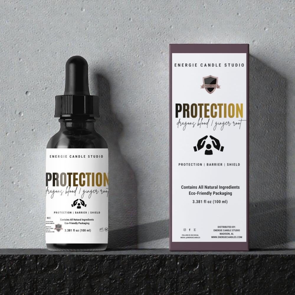 Energie Candle Studio Protection candle bottle and packaging on a gray background