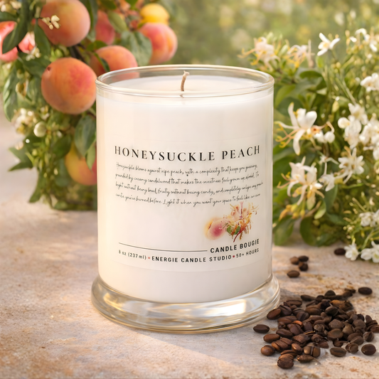 Honeysuckle Peach candle with peaches and flowers in the background