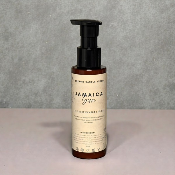Lotion bottle labeled 'Jamaica Sun' on a gray background