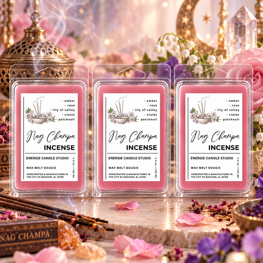 Three pink wax melt packages labeled 'Ning Champa Incense' are displayed in a styled setting with incense sticks, petals, crystals, and warm decorative background elements.