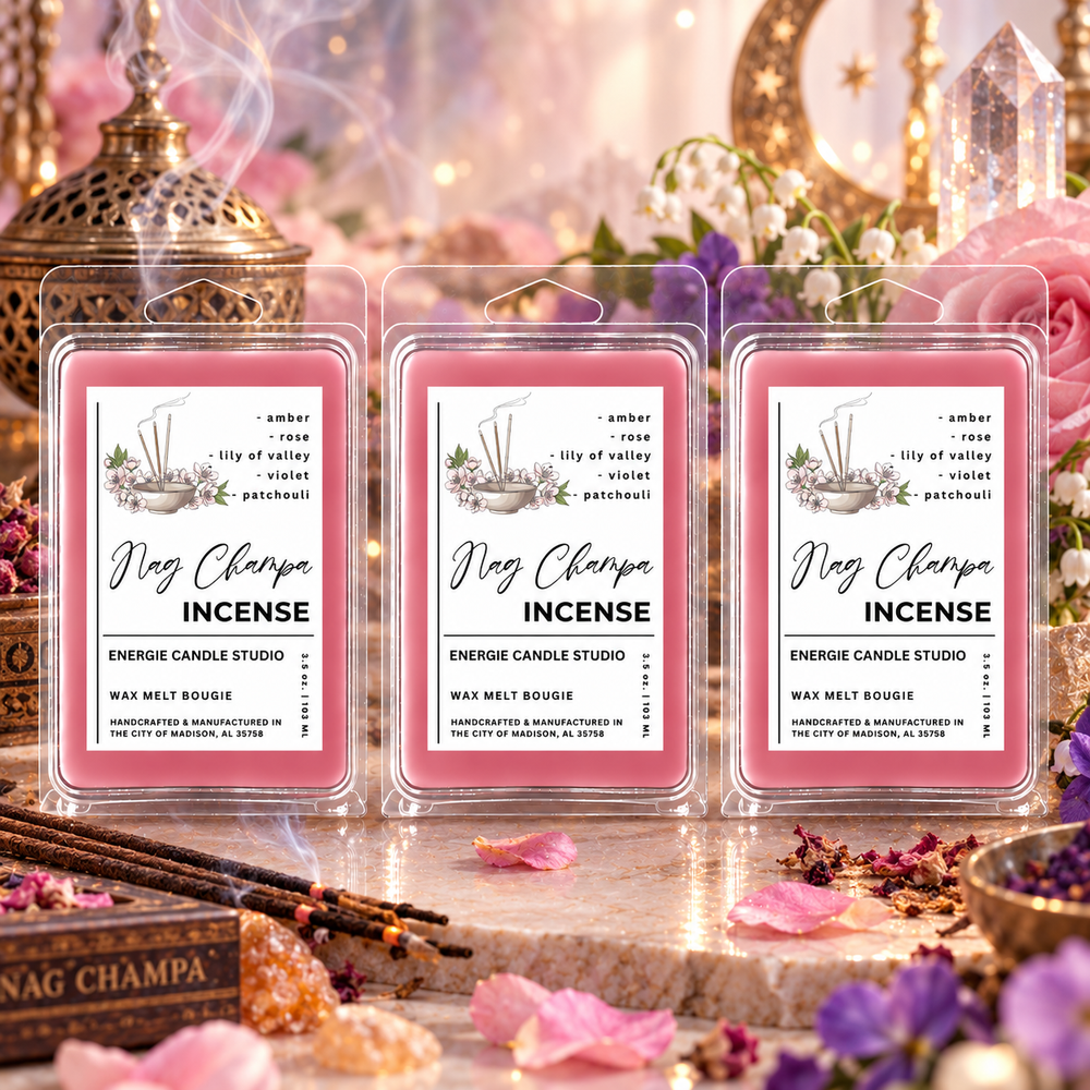 Three pink wax melt packages labeled 'Ning Champa Incense' are displayed in a styled setting with incense sticks, petals, crystals, and warm decorative background elements.