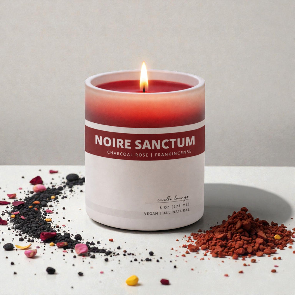 Candle labeled 'Noire Sanctum' with decorative elements on a light background