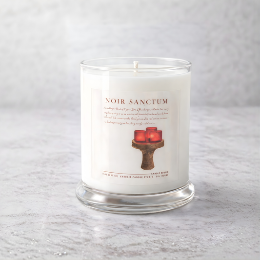 Candle with a label on a gray surface