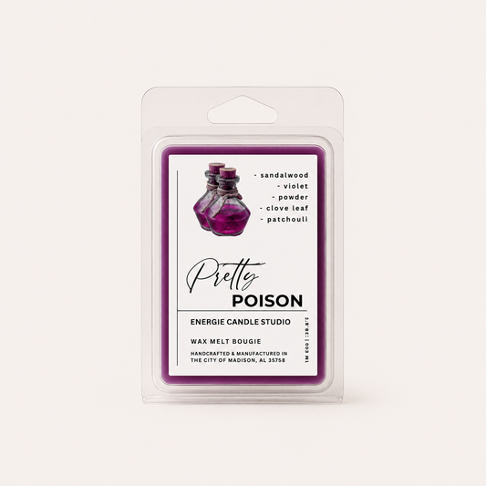 A packaged wax melt product in a clear plastic clamshell package with a white label featuring a purple border and an illustration of purple perfume bottles. The label reads 'Pretty POISON' and 'ENERGIE CANDLE STUDIO,' with scent notes including sandalwood, violet, powder, clove leaf, and patchouli.