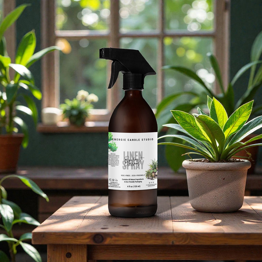 Brown spray bottle with a label on a wooden table surrounded by plants