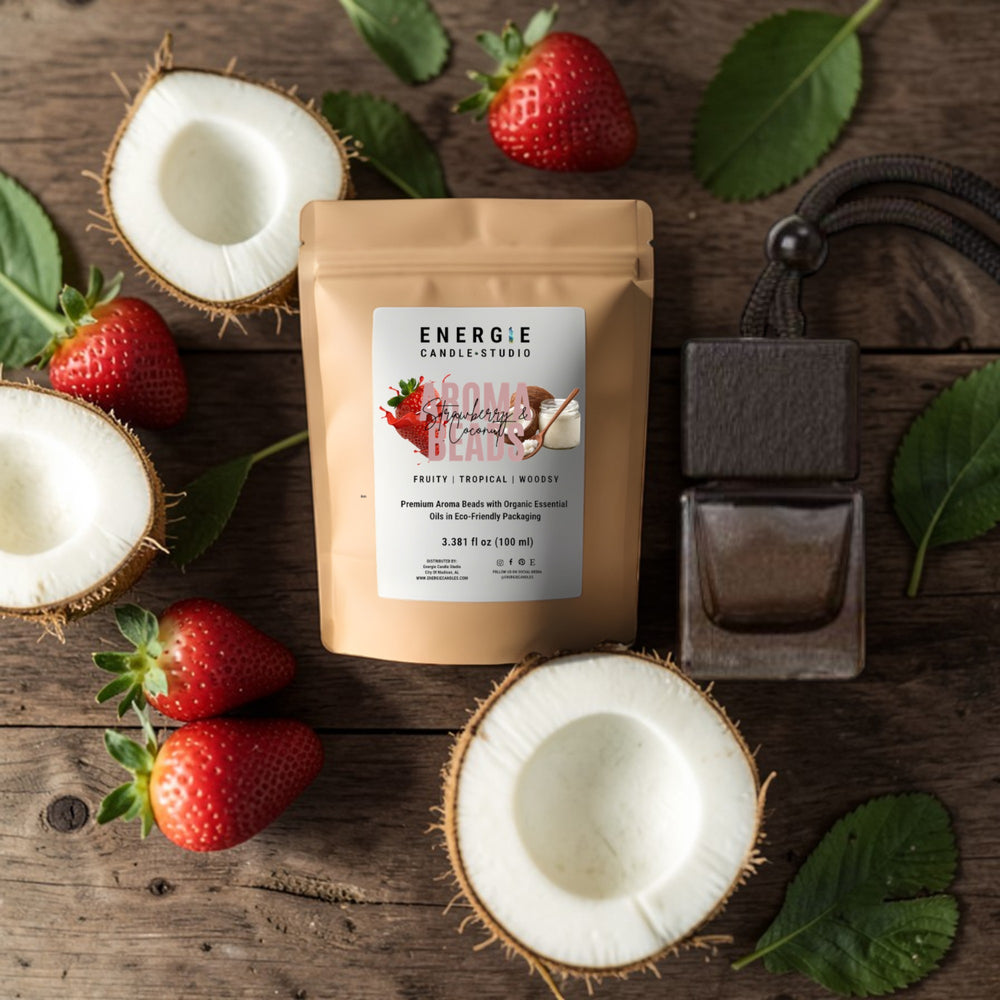Energie Candle Studio product with coconuts and strawberries on a wooden surface