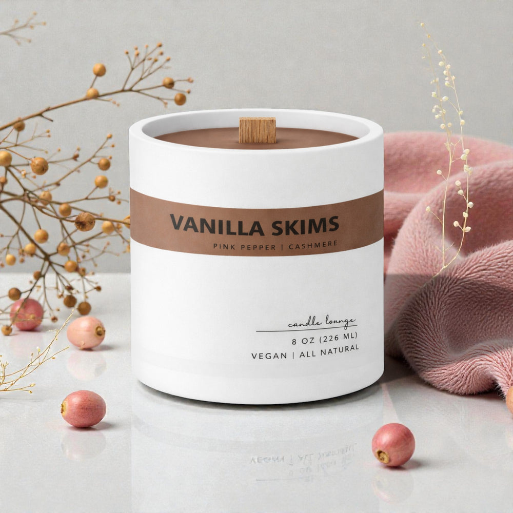 Vanilla Skims candle with decorative elements on a light surface